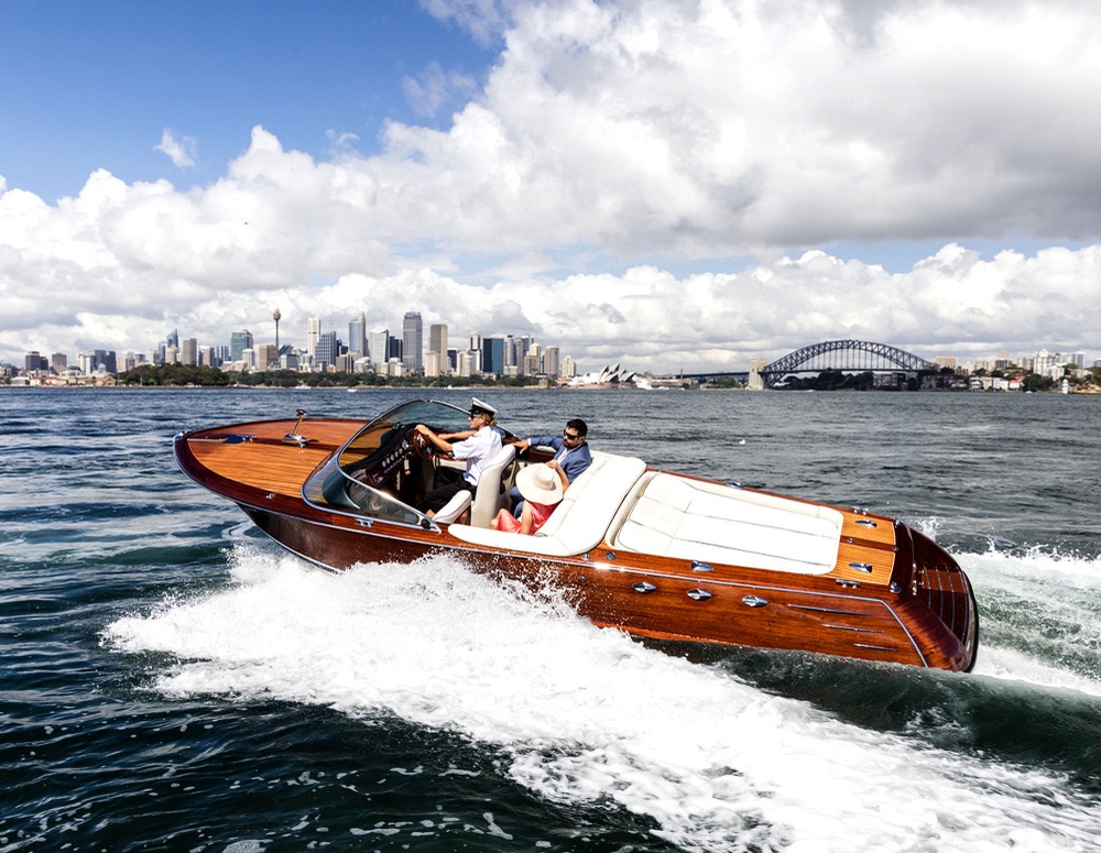 La Dolce Vita cruising past the Sydney skyline